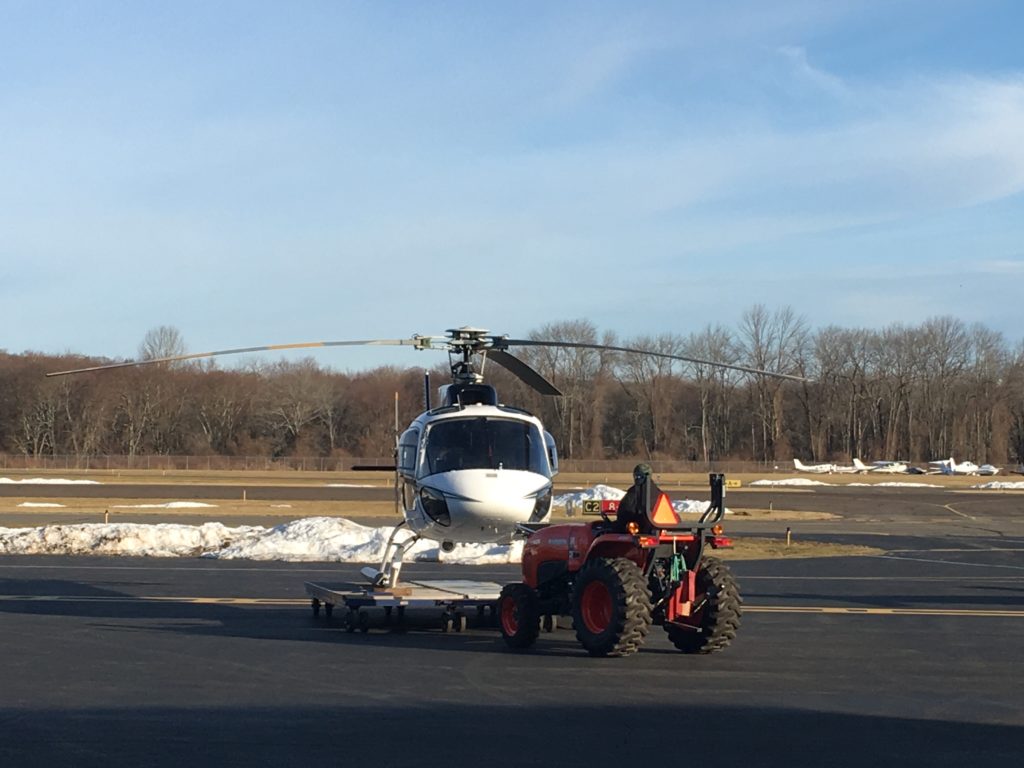 Helicopter being towed